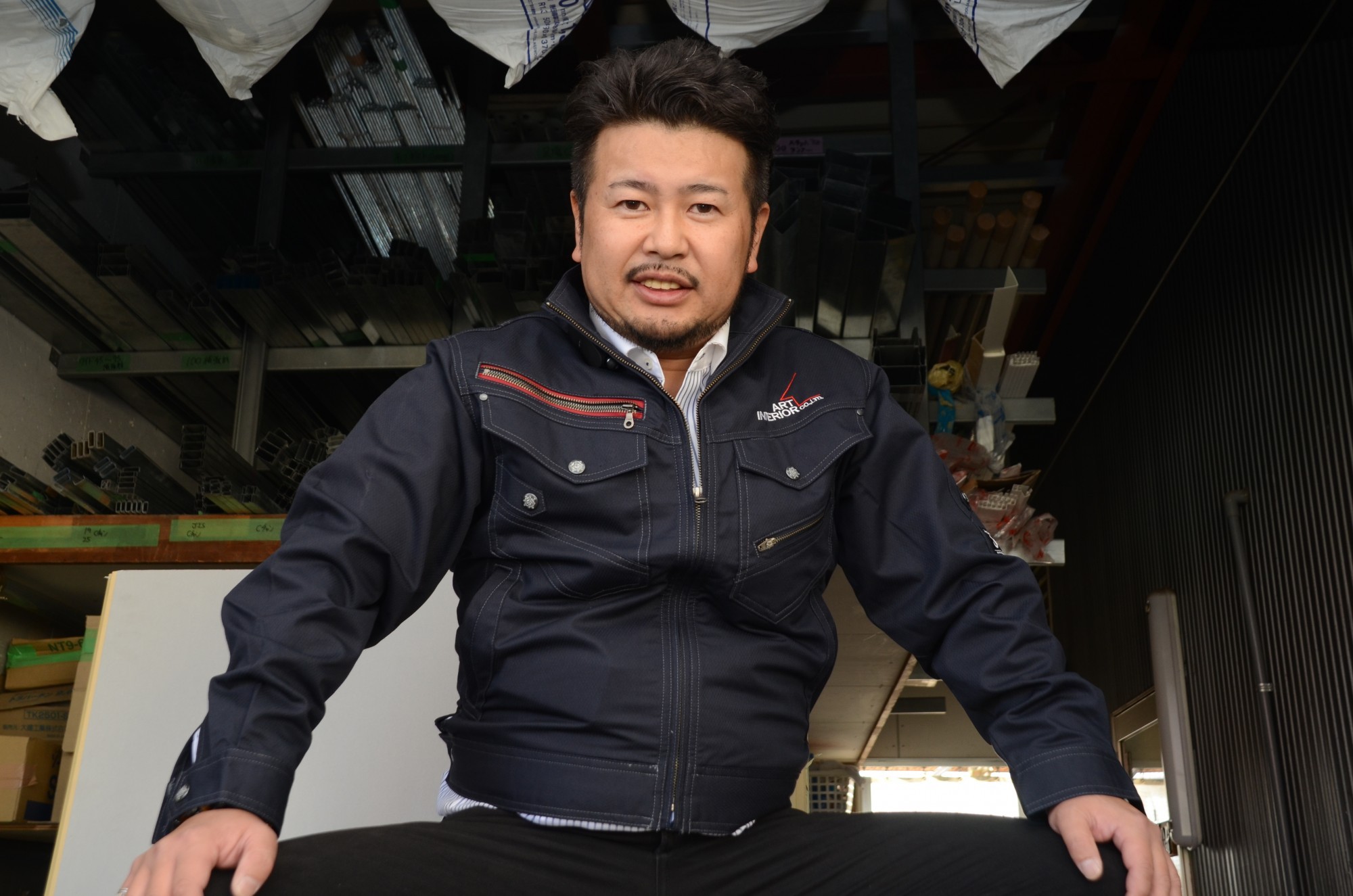 アートインテリア株式会社のロゴ